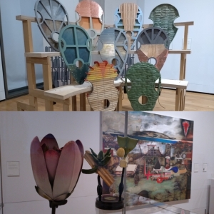 Composite picture of two works of art. Top: a wooden rack, loaded with various large stylised mouse masks. Bottom: close up of two flower maquettes with a large surrealist painting behind them.